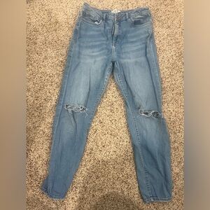 Light distressed jeans in great condition. Slim fit. No damage.